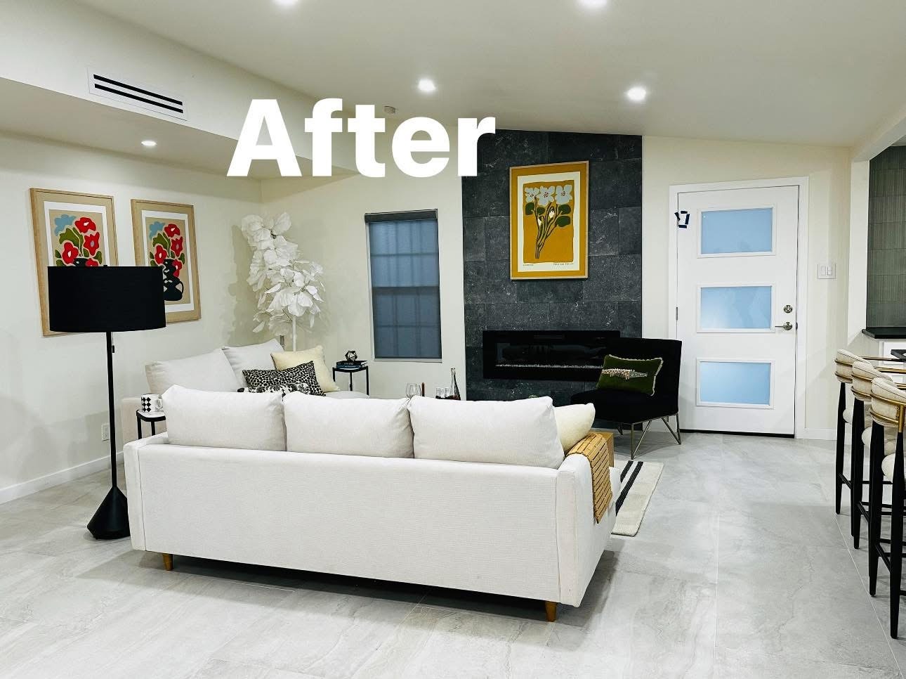 Remodeled living room with new flooring and lighting in an El Paso home